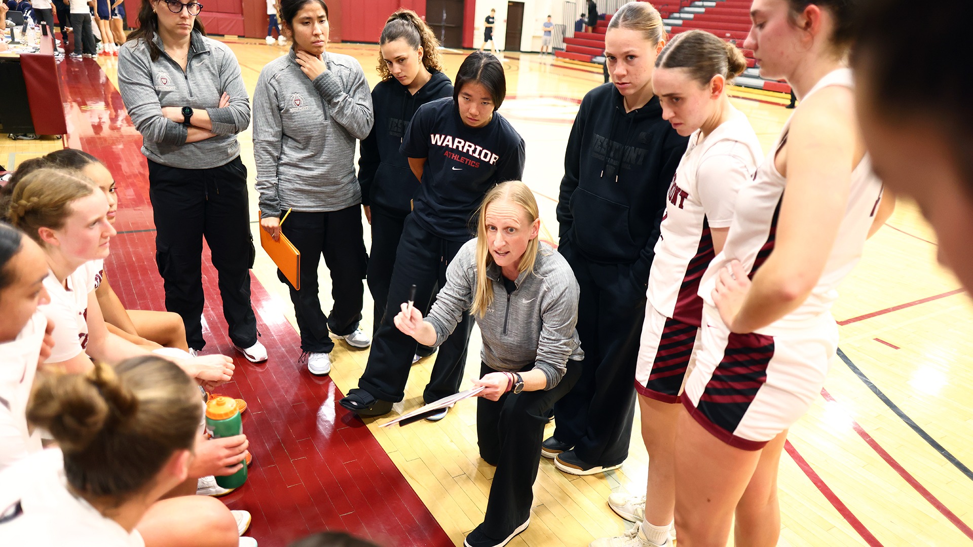 Women's Basketball Huddle (Photo by Brad Elliott)
