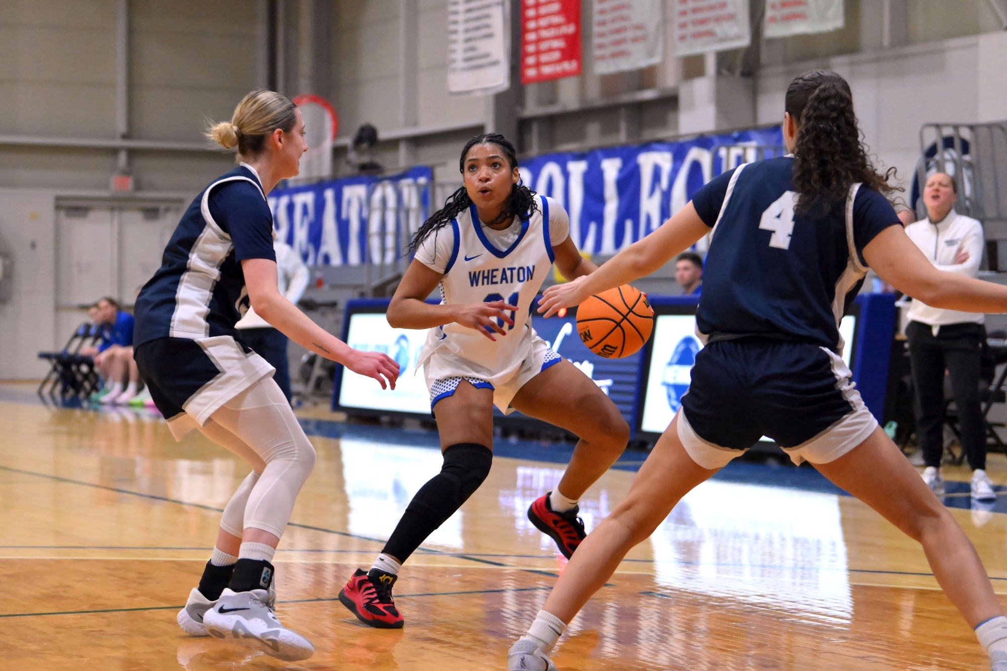 WBB Action - Cheyenne Colbert steps back vs Brandeis