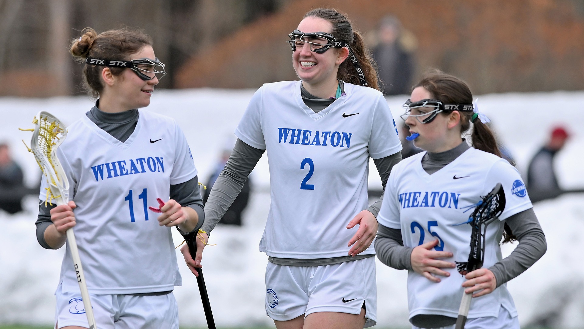 Qua, Georgia, Jessica Chamberlin, Kaydie O'Neil action vs. Worcester State