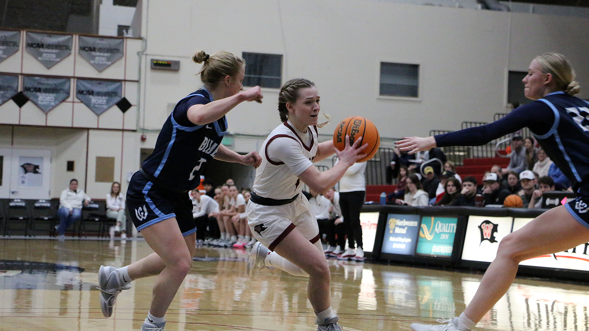 Sydney McLean drives the lane vs. Whitman