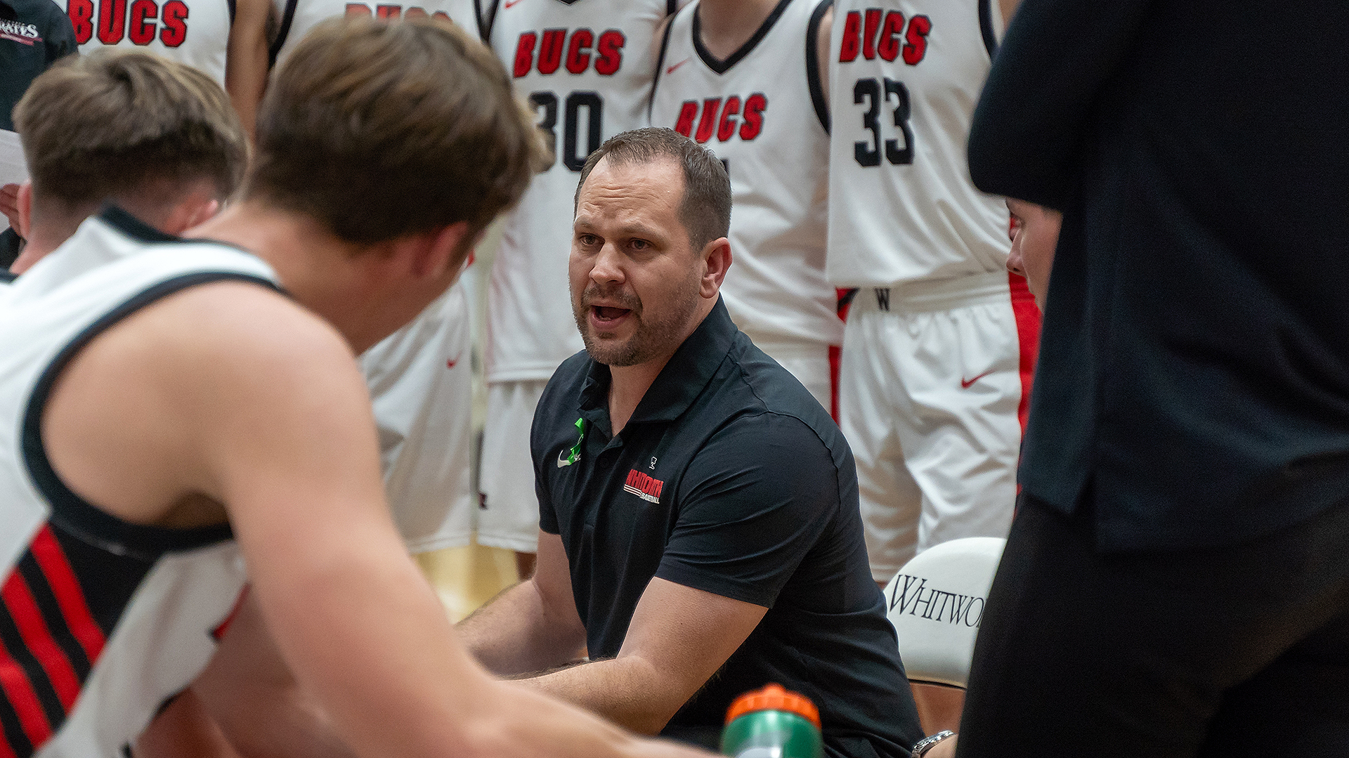 Damion Jablonski coaches the Pirates during a timeout vs. Hardin-Simmons