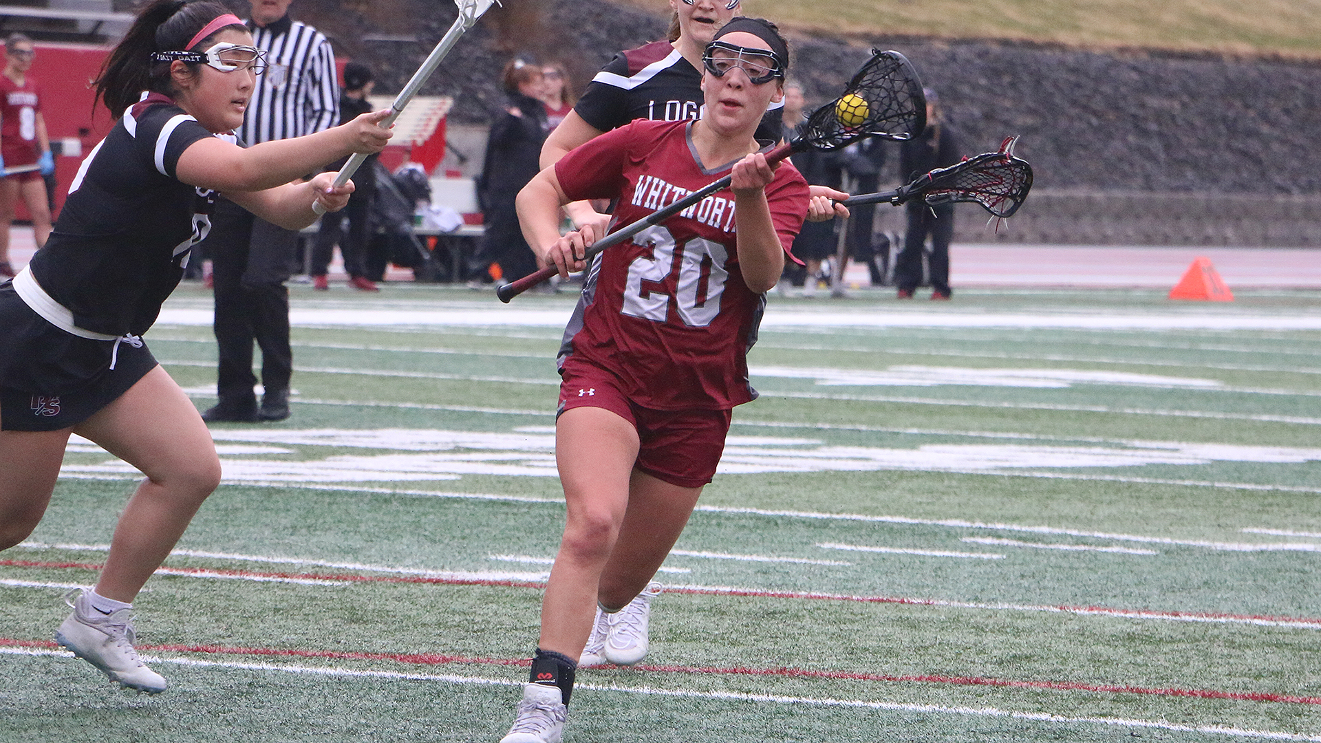 Jordyn Bennett drives toward the net vs. UPS