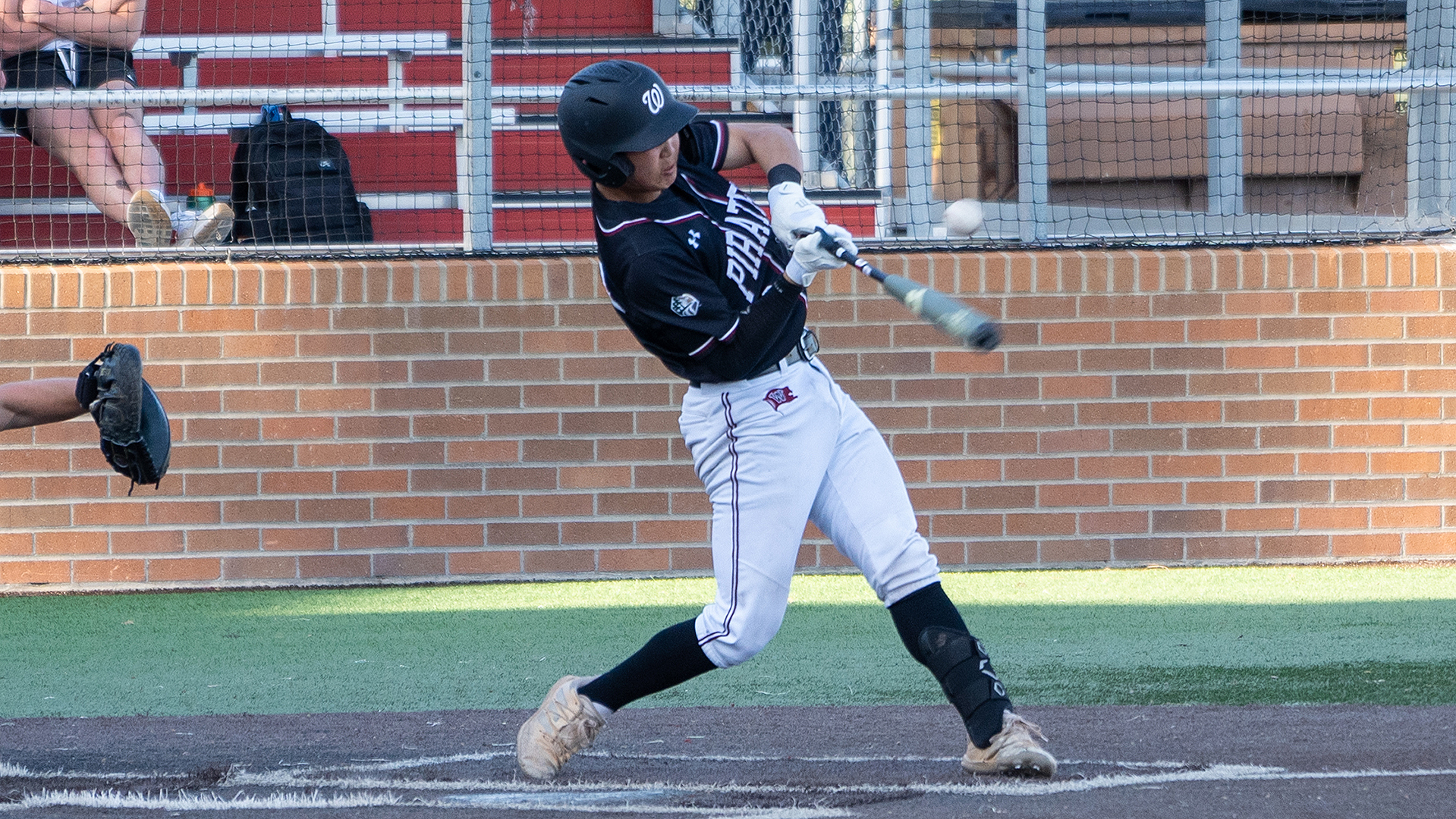 Ty Komoda bats in the second game vs. Whitman