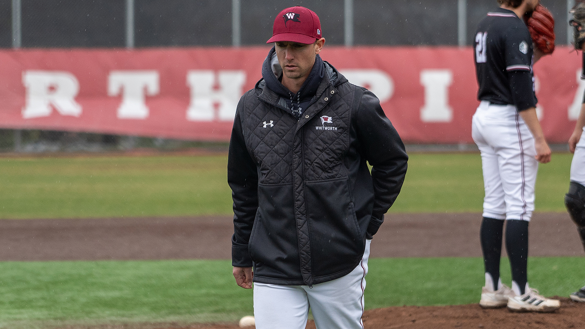 CJ Perry heads back to the dugout in the opener vs. CMS