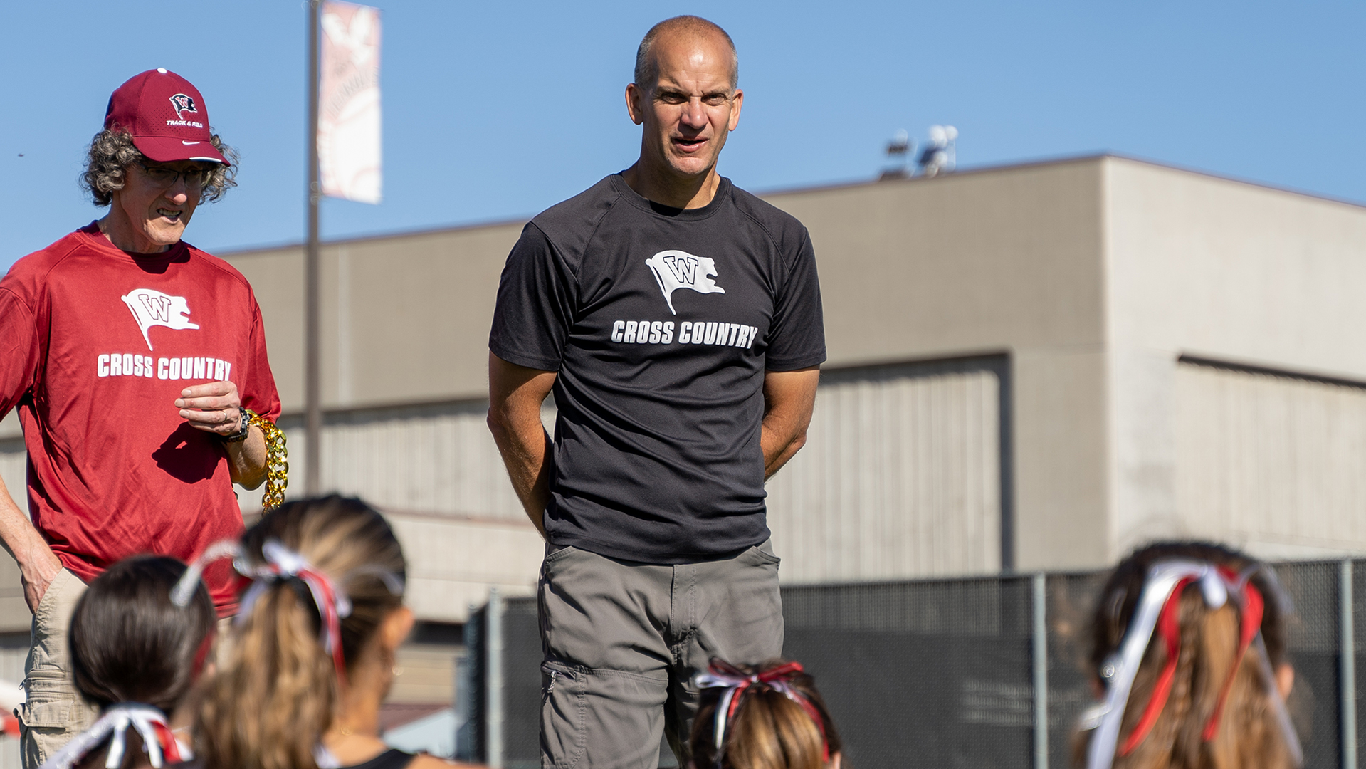 Toby Schwarz talks the the women's team after the Clash of the Inland Northwest 2024