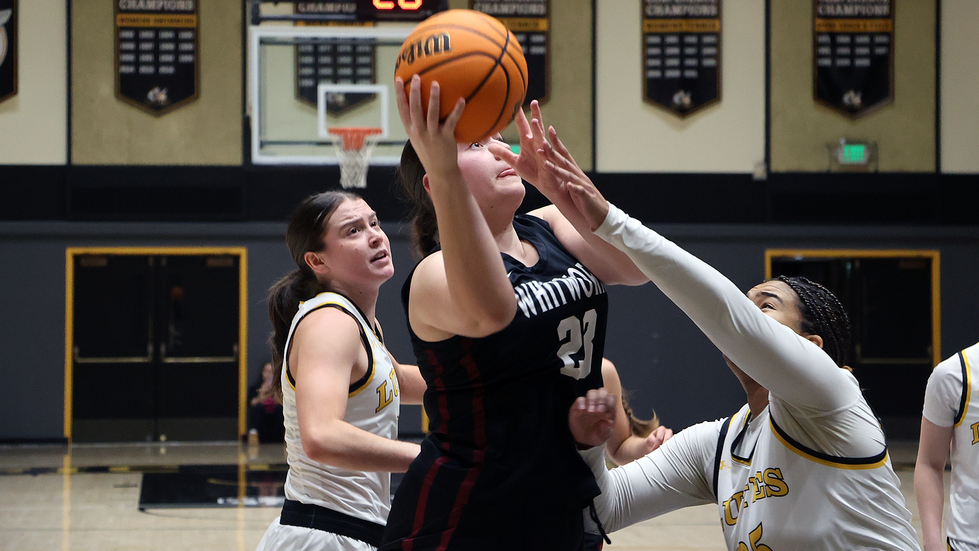 Addyson Gallatin scores in traffic at PLU