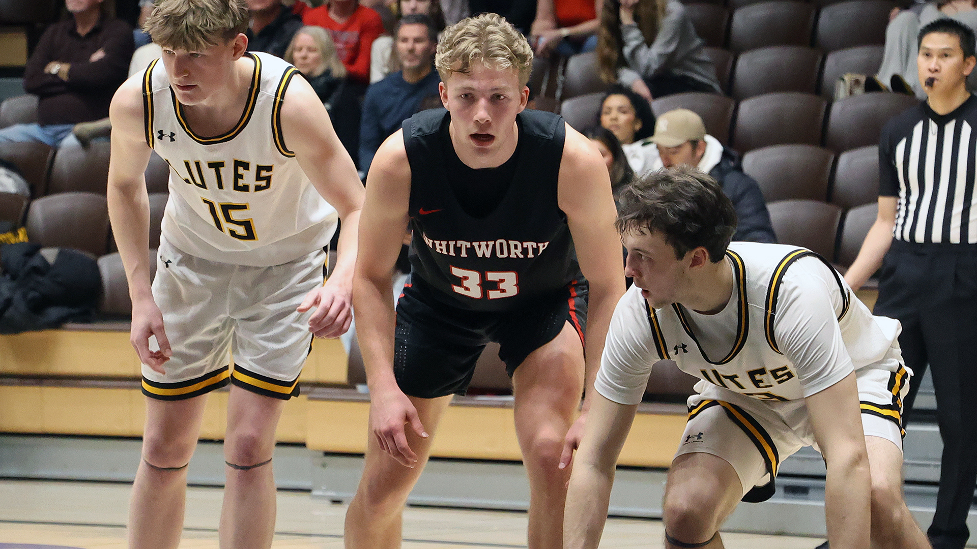 Colton Looney sets himself to rebound on a free throw at PLU