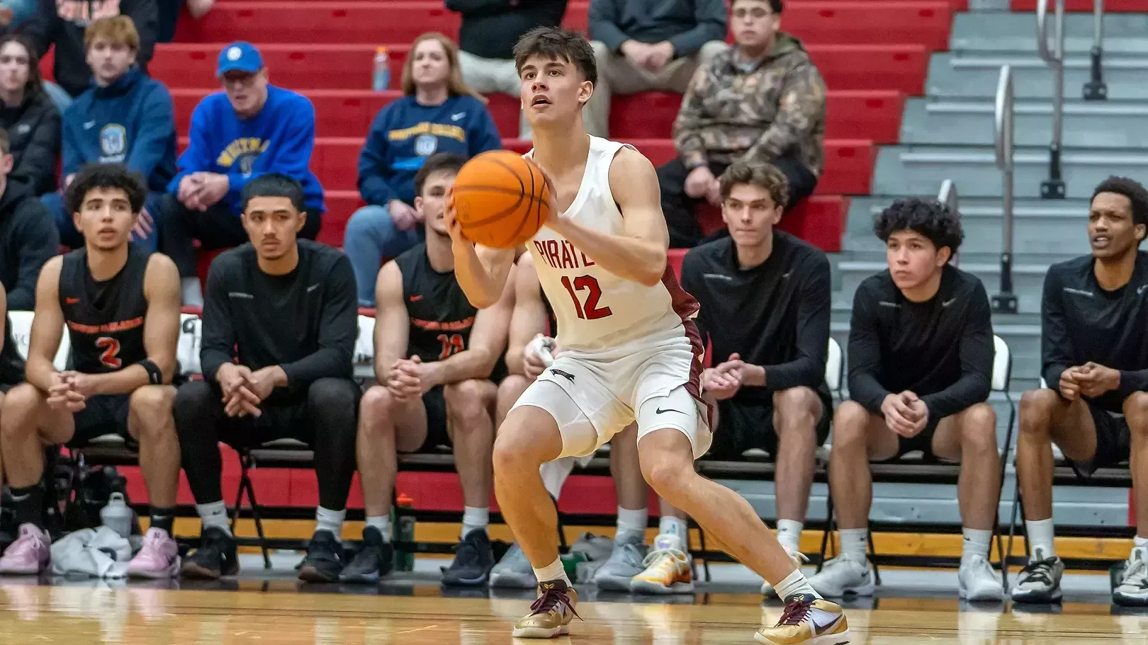Dylan Westermeyer lines up a jump shot at the NWC MBB Semifinal