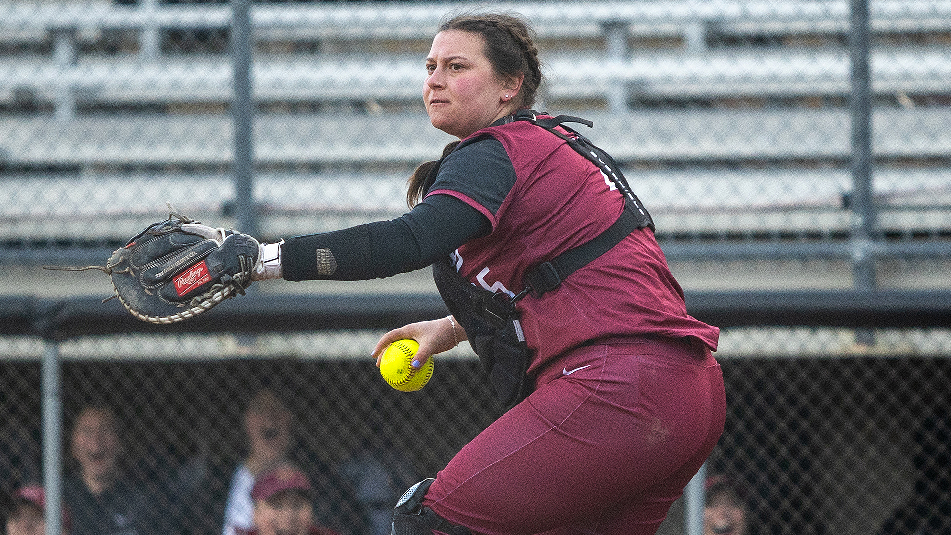 Taylor Hofheins looks to throw out a baserunner vs. Willamette