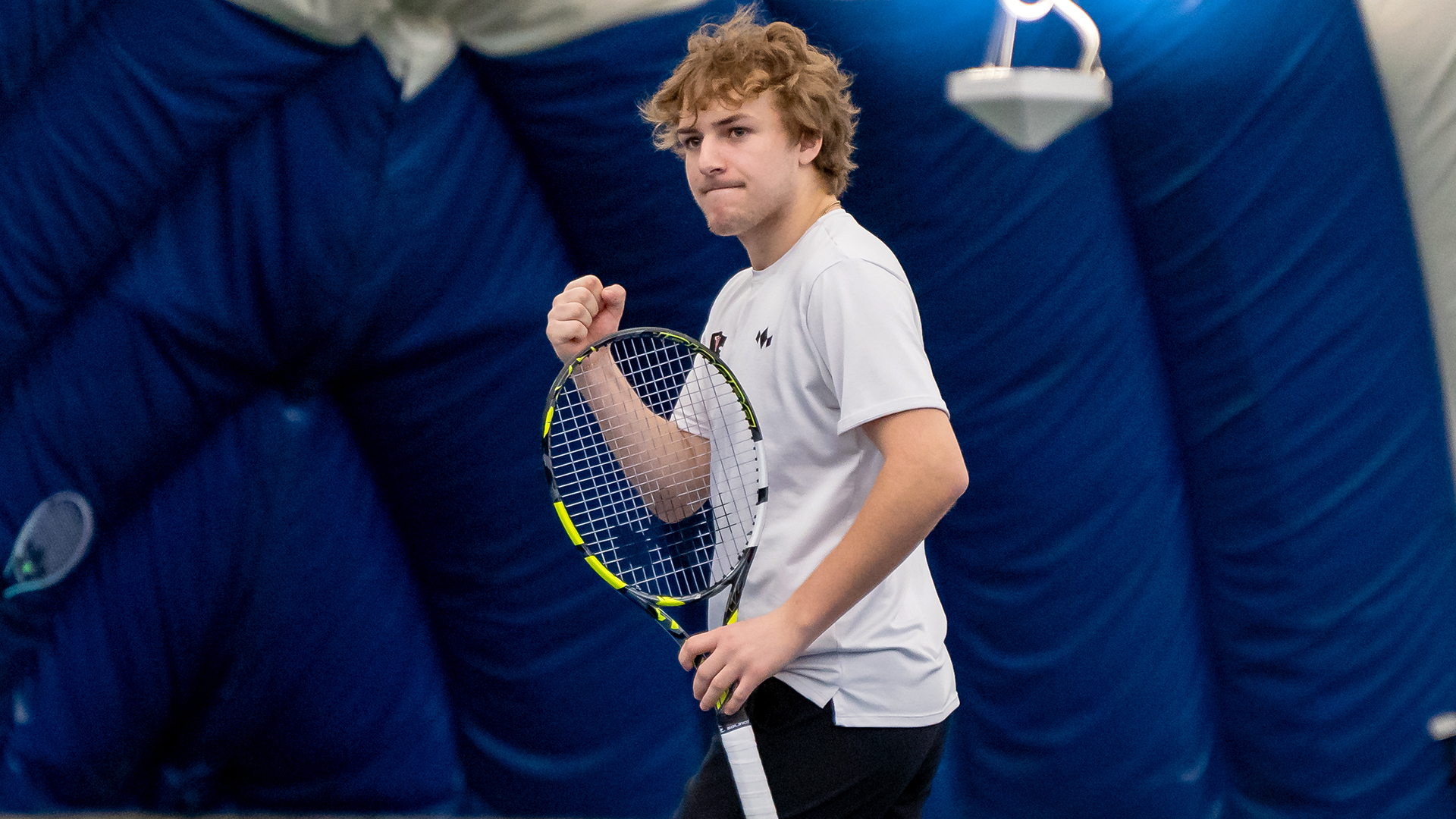 Matt Froslan celebrates a point vs. Whitman