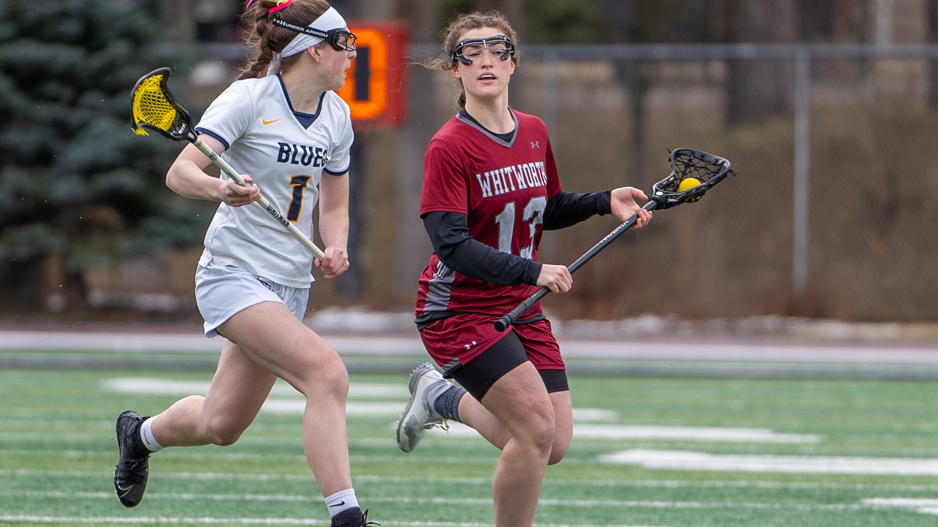 Megan Whitman carries the ball upfield vs. Whitman