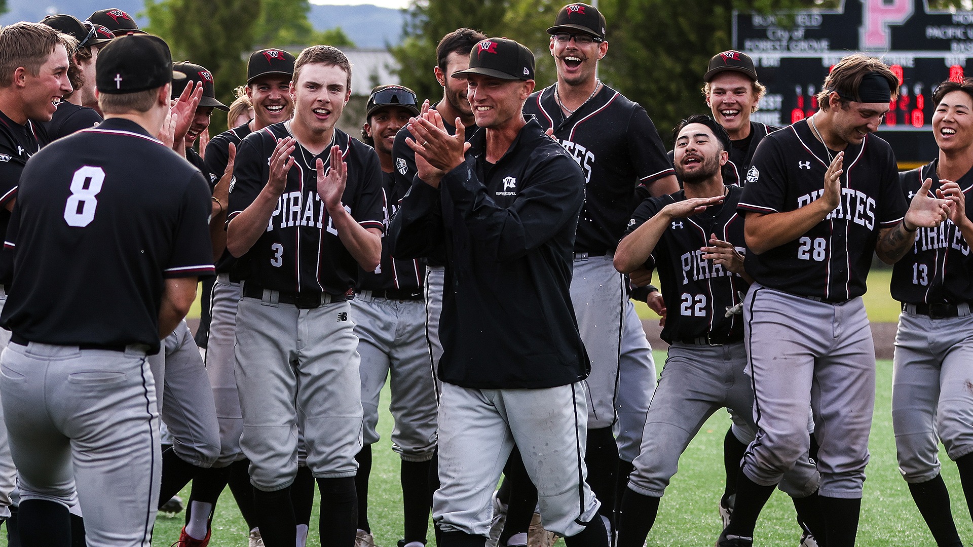 CJ Perry celebrates with the team at the NWC Baseball Championship 2025