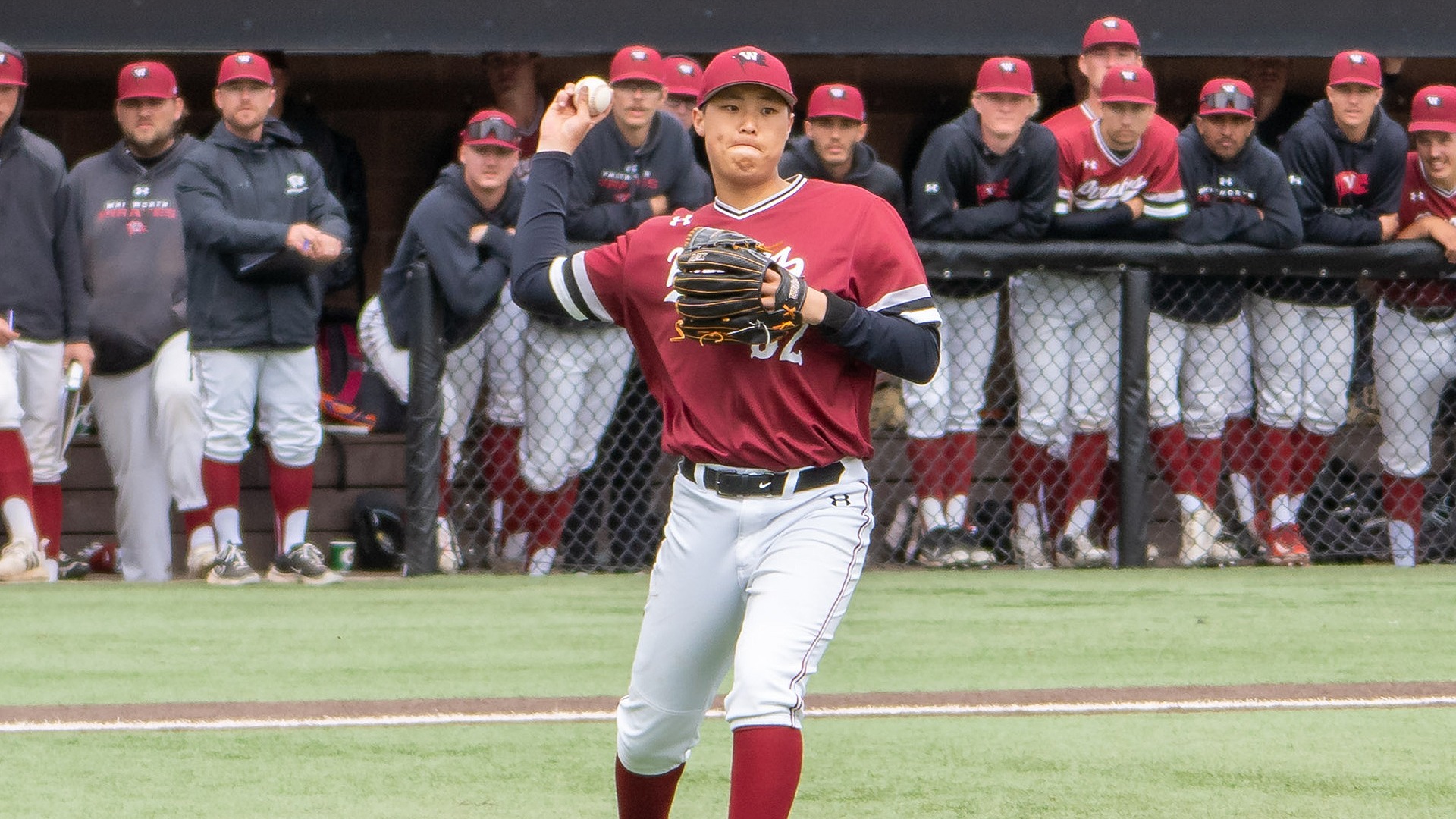 Nathaniel Kurano throws a runner out at first base vs. PLU 2025
