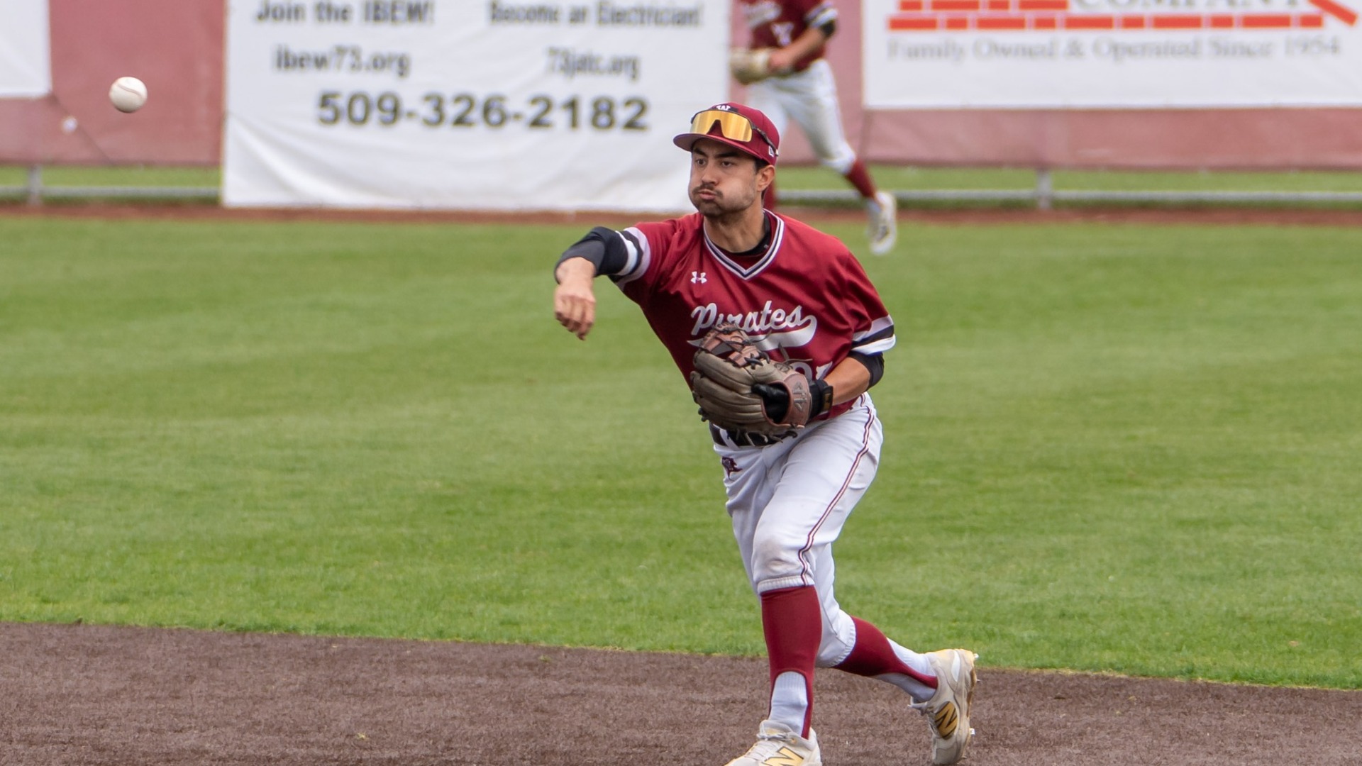 Austin Paul throws to first base vs. PLU 2025