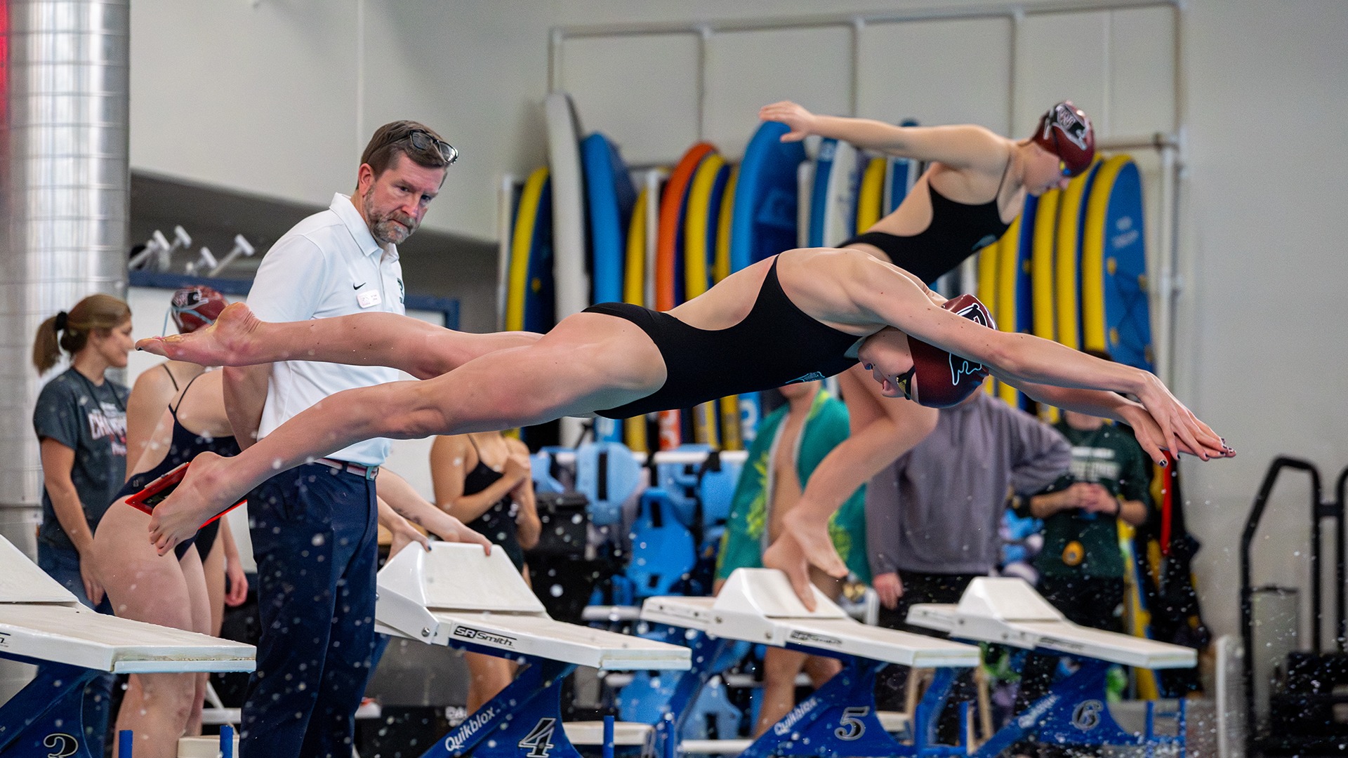 Kallie Badry anchors the medley relay vs. George Fox