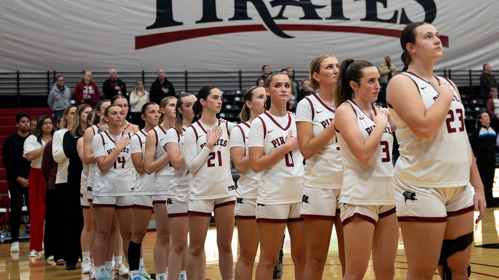 Whitworth listens to the national anthem ahead of its game vs. Willamette 2025-26