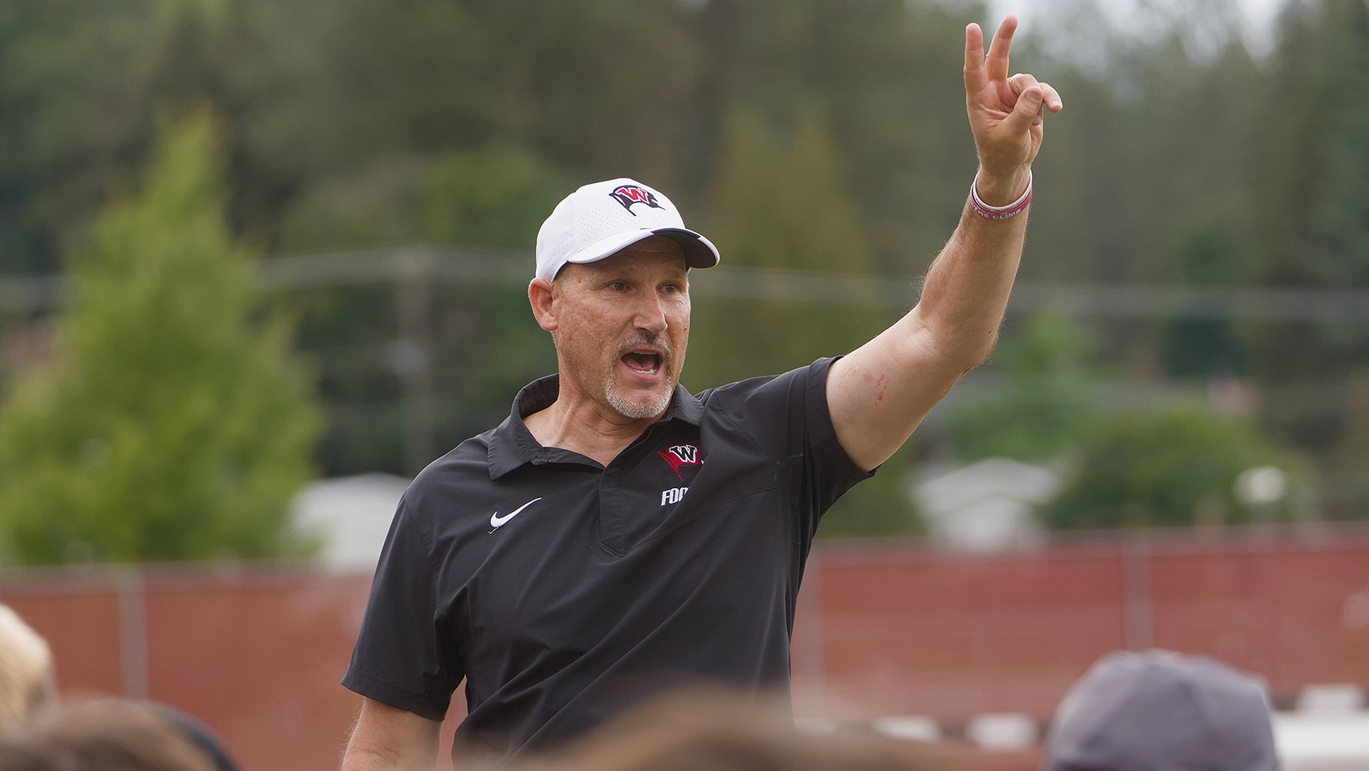 Rod Sandberg addresses the team after a win vs. Utah Islanders