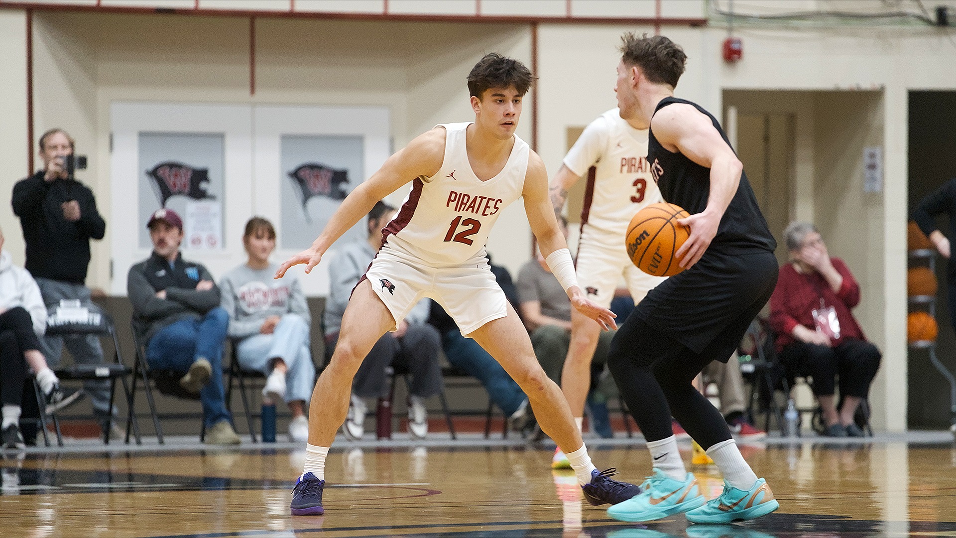Dylan Westermeyer plays defense vs. Willamette in the NWC Final 2026