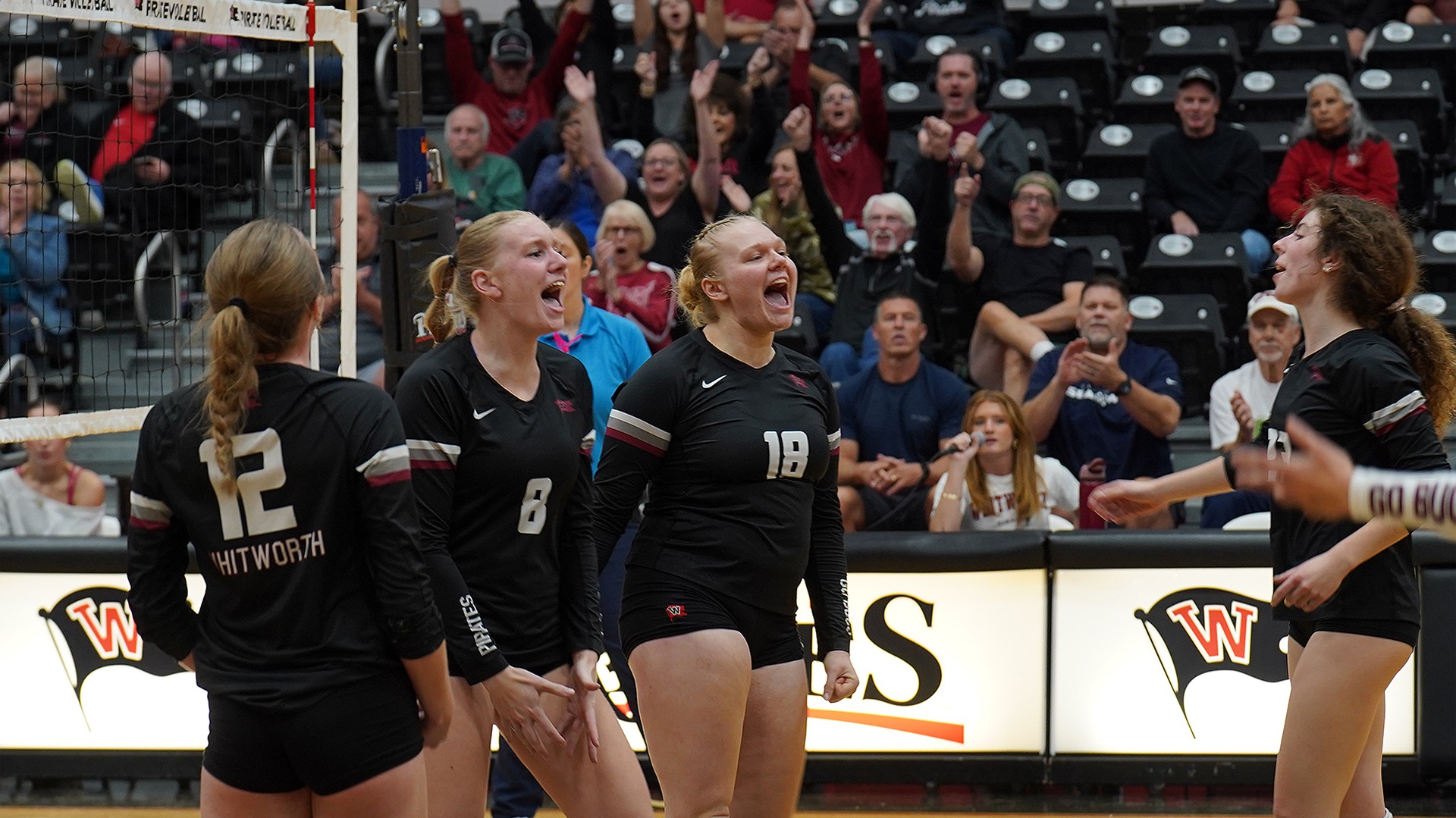 The Pirates celebrate the penultimate point vs. Willamette 2026