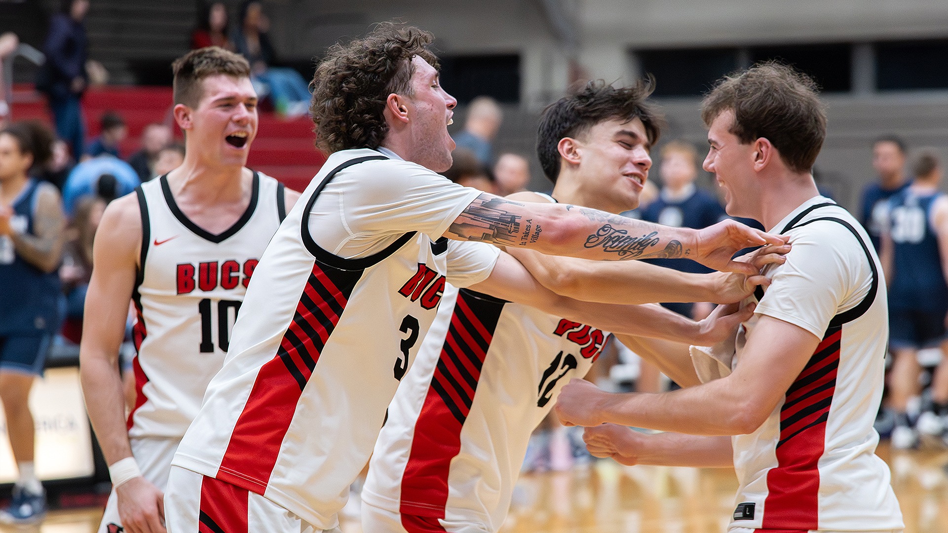 The Pirates celebrate a win vs. Whitman 2025-26