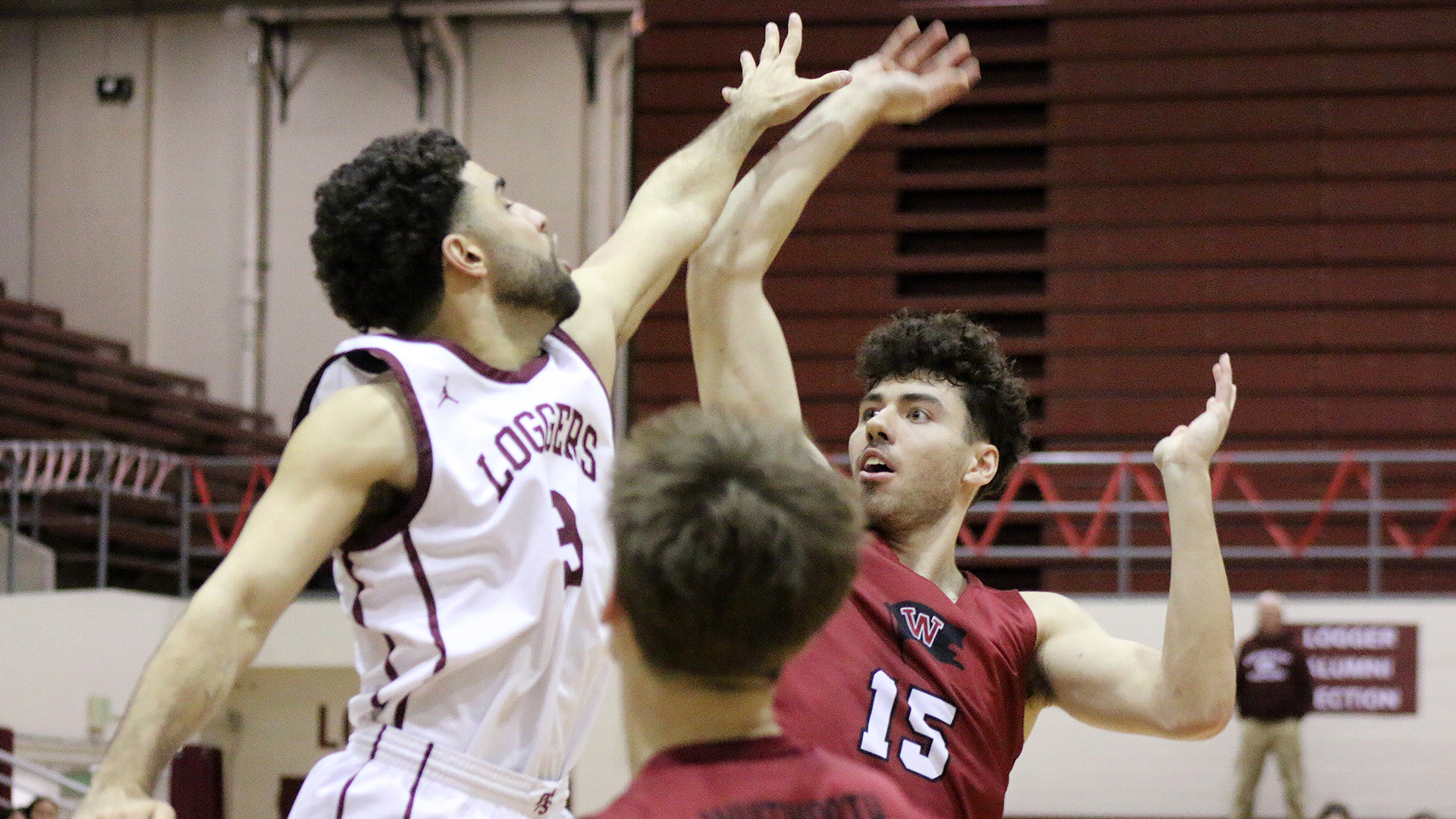 Stephen Behil scores a tough inside basket at Puget Sound 2025-26