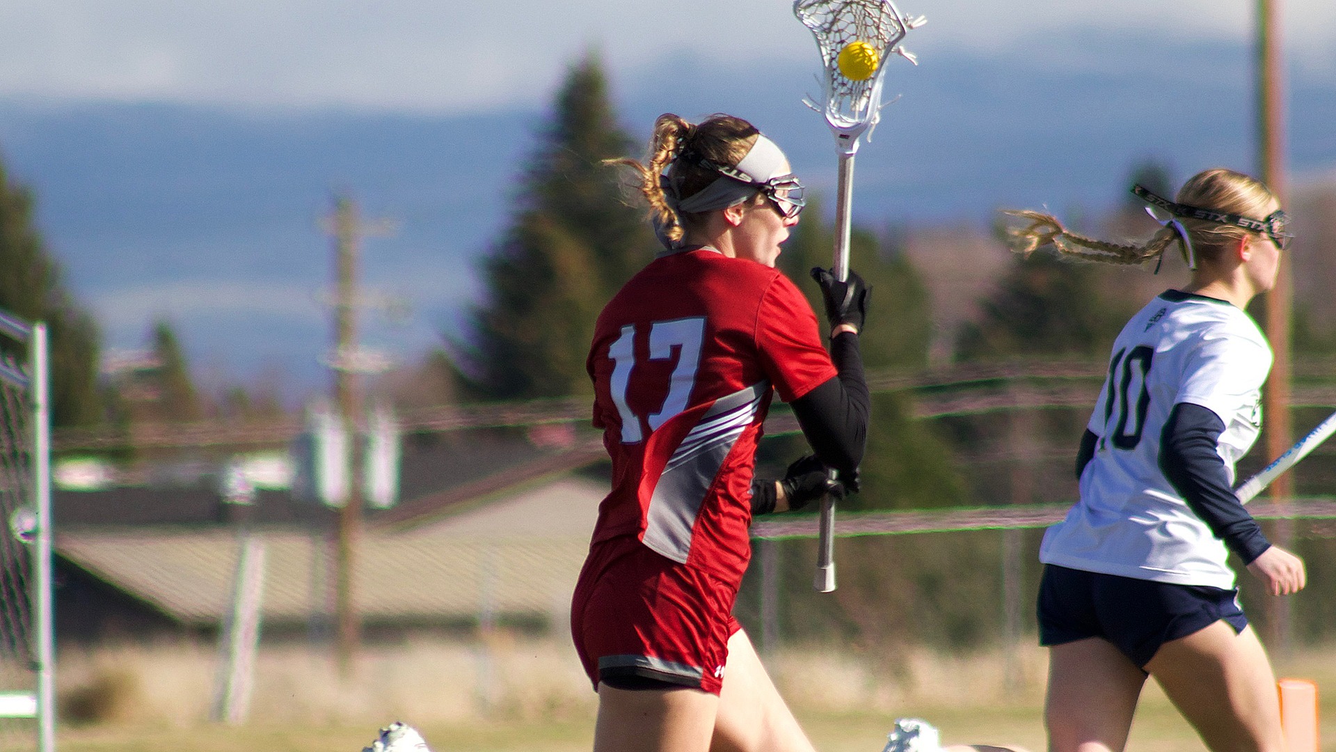 Kiera Paulus carries the ball upfield at Eastern Oregon 2026