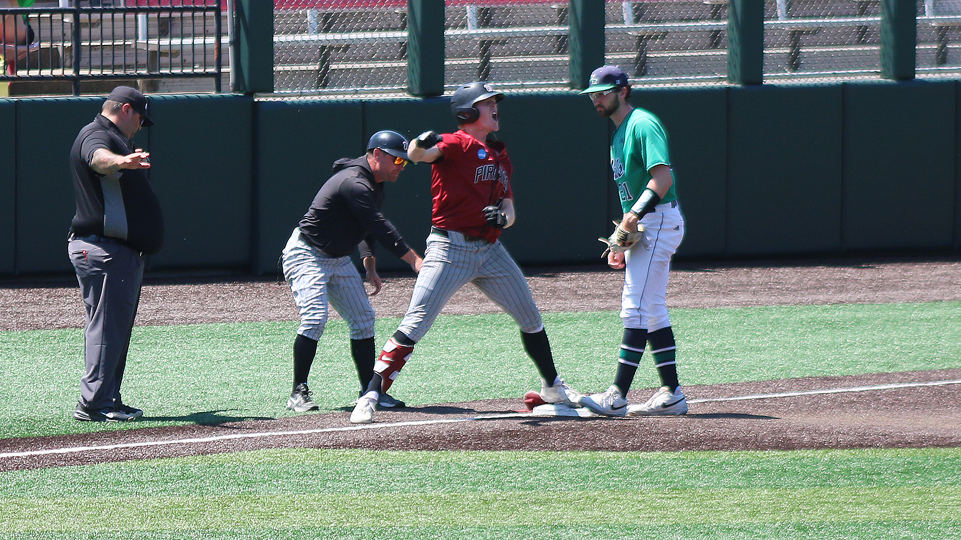 Caleb Gray celebrates his RBI triple vs. Endicott at the NCAA Div. III Regional 2026