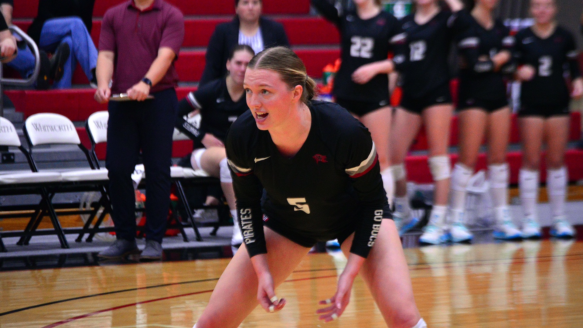 Lindsey Short receives serve vs. Linfield 2026