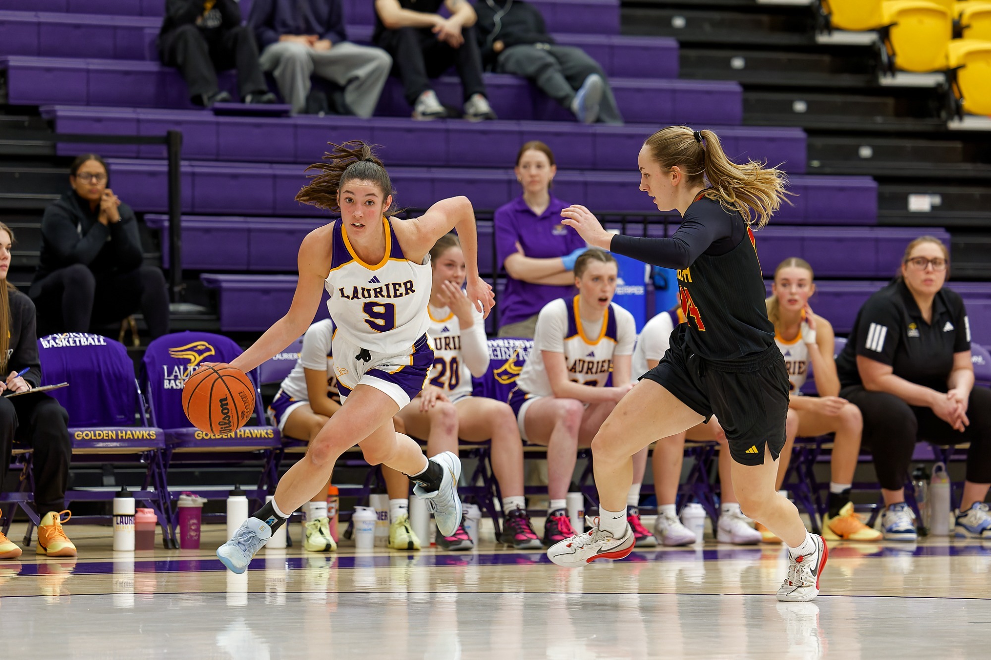 Isabella Cotton drives past a Guelph defender.