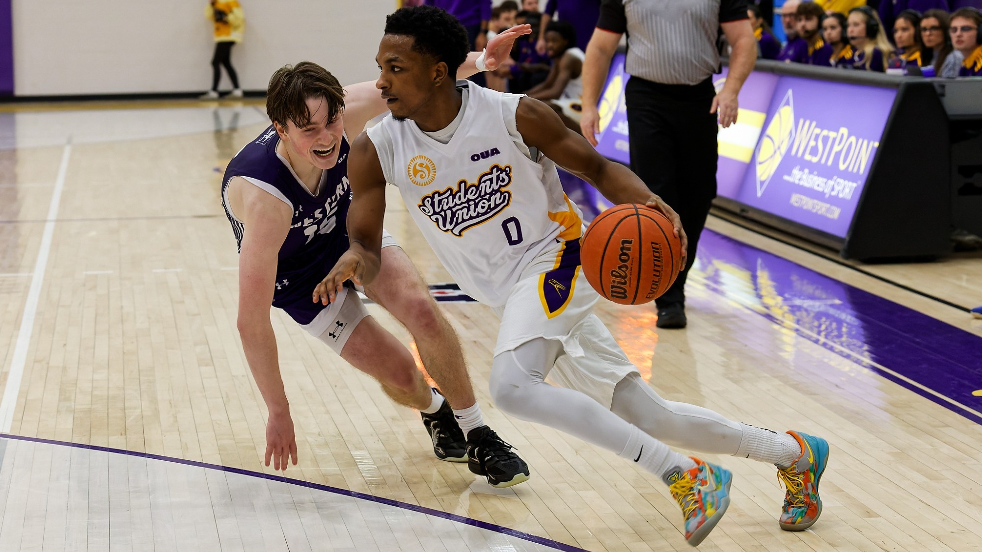 Malik Malik Langenegger drives past a Western defender.Langenegger drives past a Western defender.