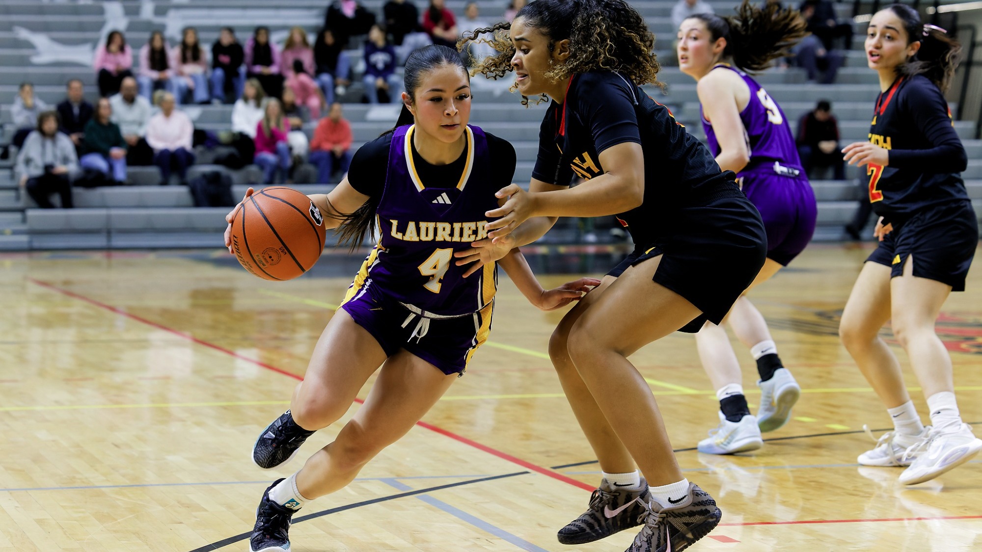 Tina Errazzo tries to dribble around a defender.