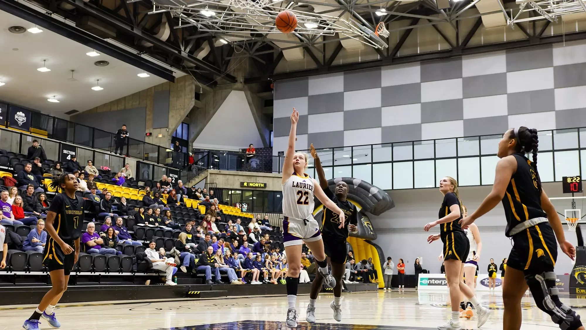 Maya Fuerth drives the lane with a fingertip roll.