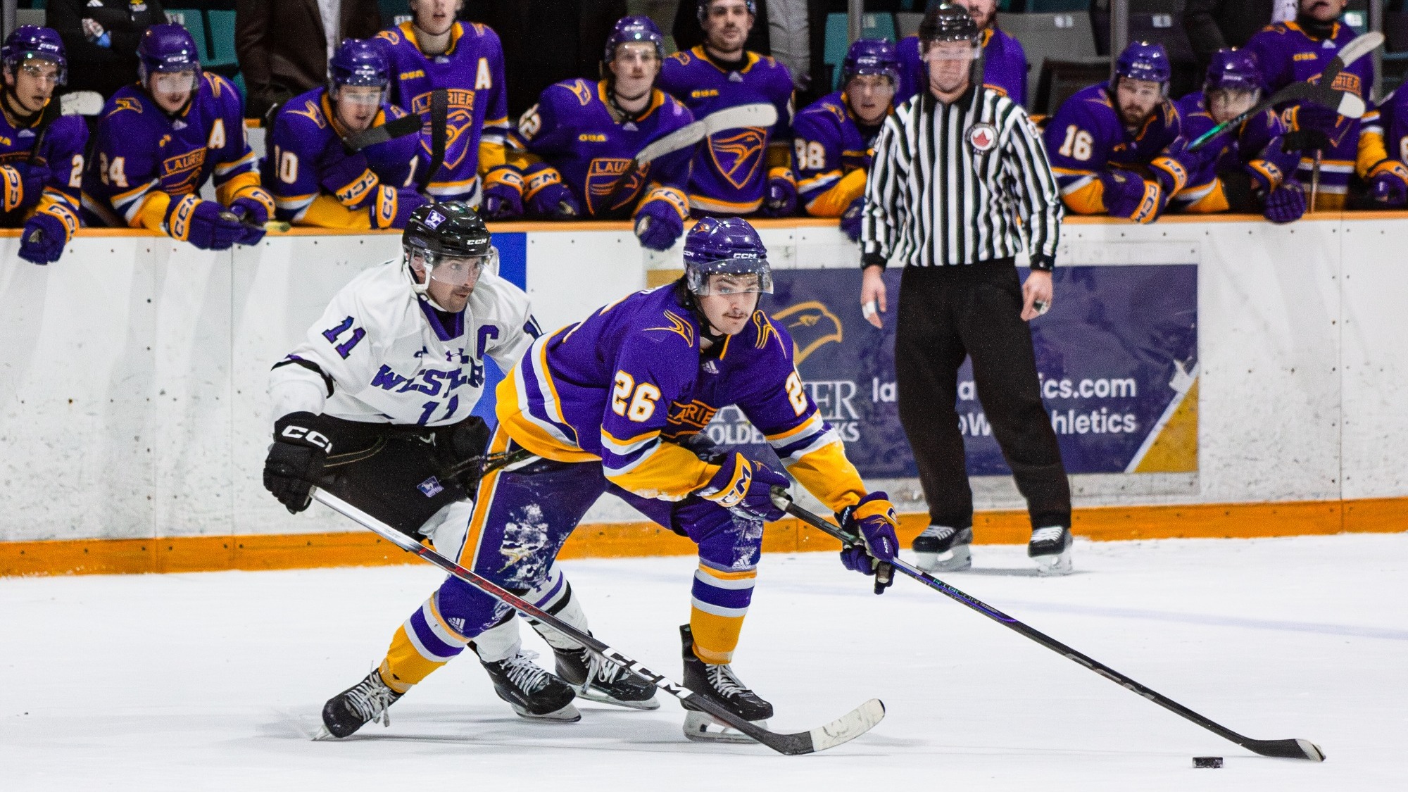 Lucas Chard reaches for the puck entering the zone against Western.