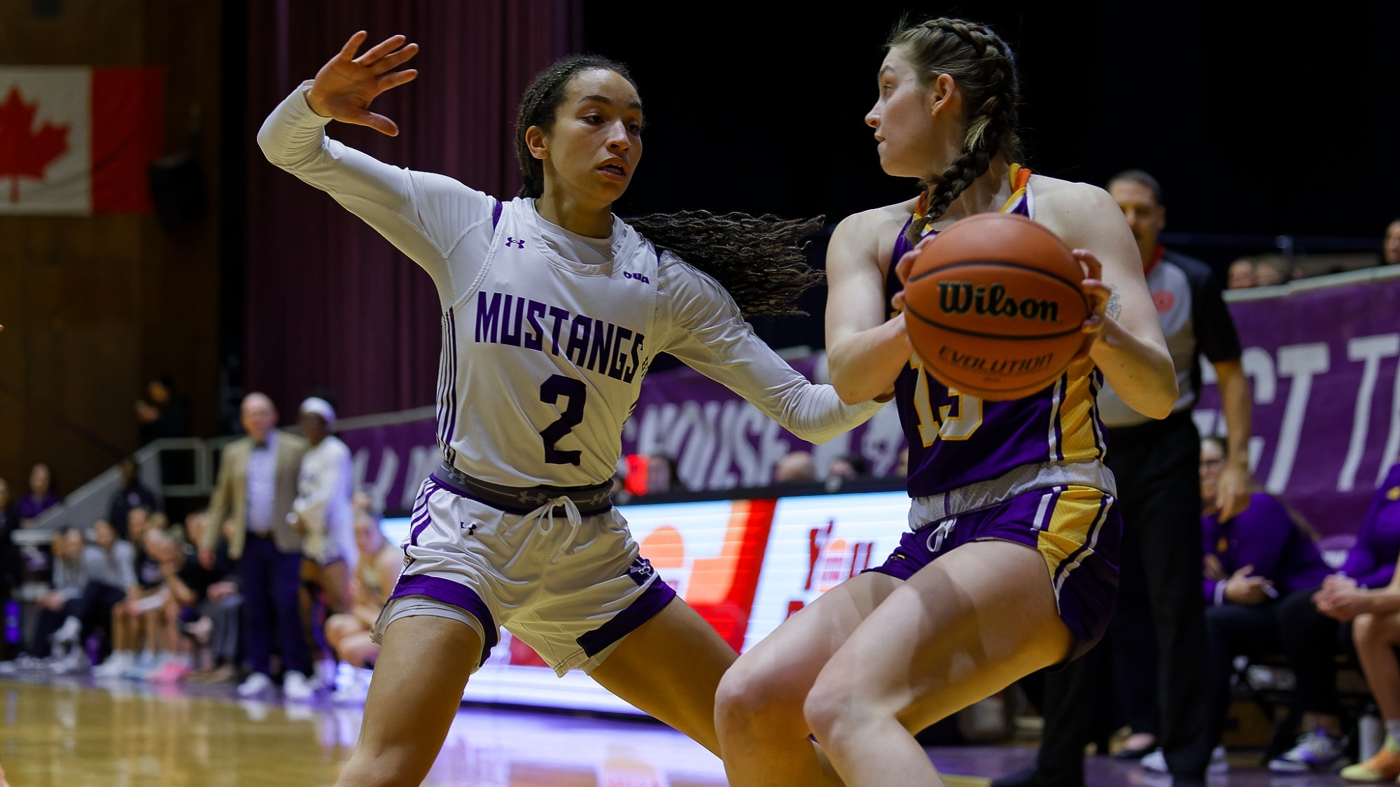 Brittyn Graves keeps the ball away from a Western defender