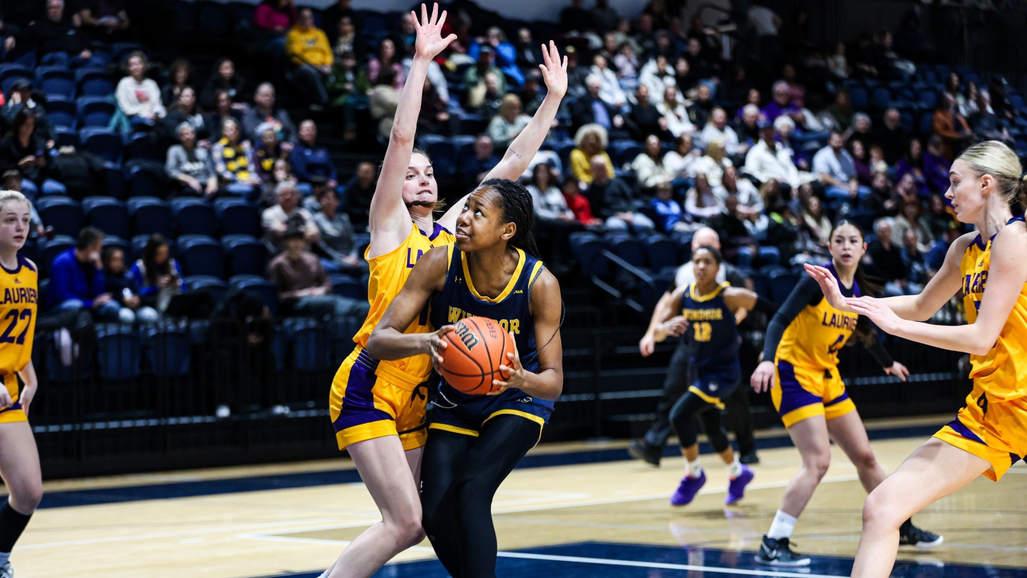 Brittyn Graves blocks the lane against Windsor.
