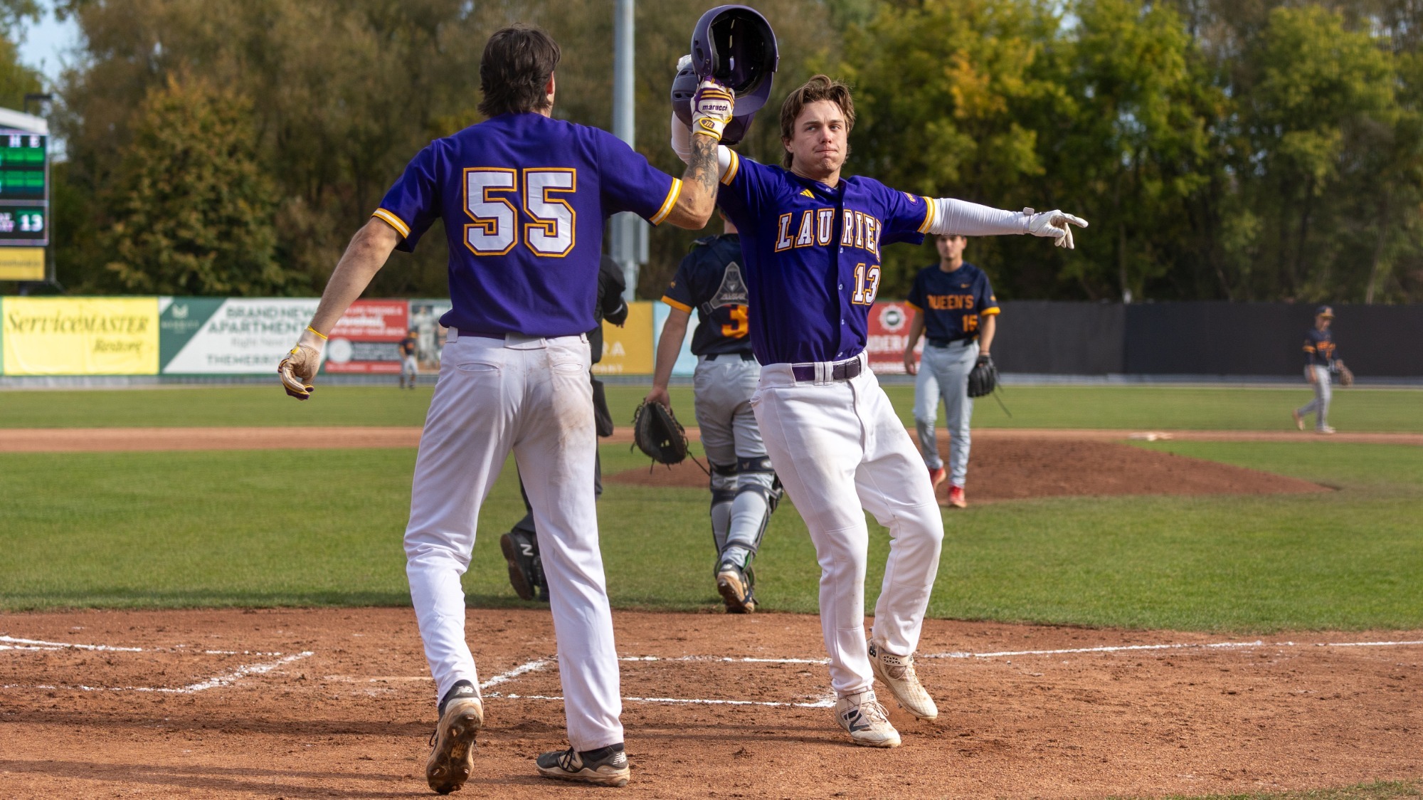 Laurier baseball celebrate a home run