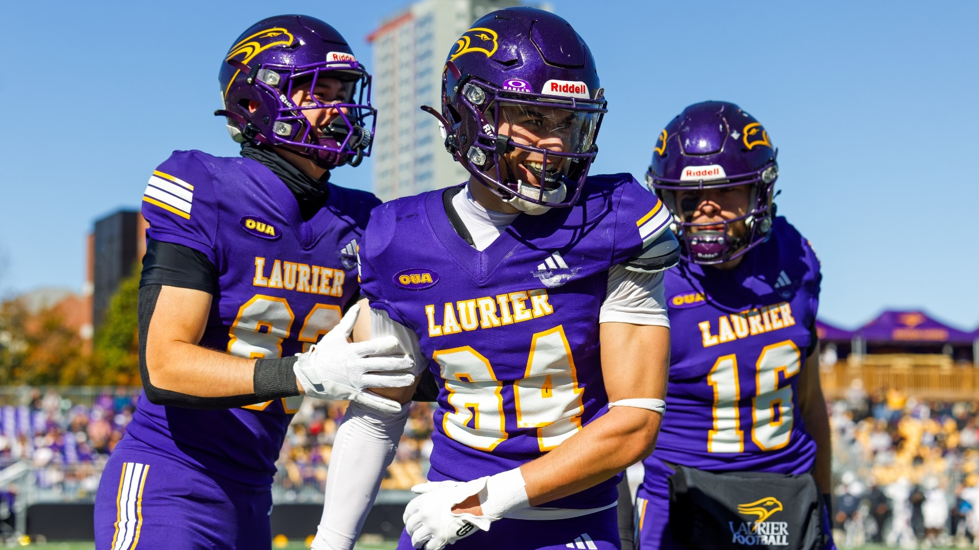 Logan Moore celebrates a touchdown