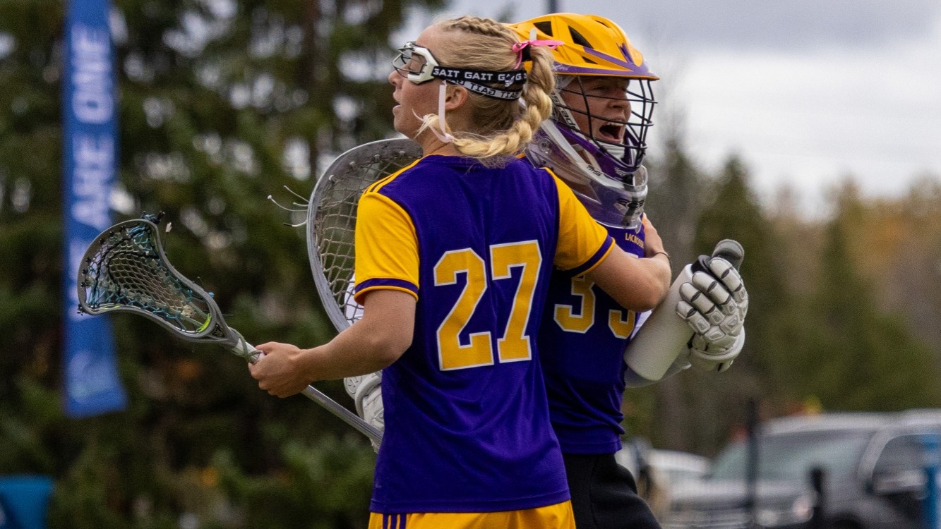 Laurier lacrosse celebrate a victory.