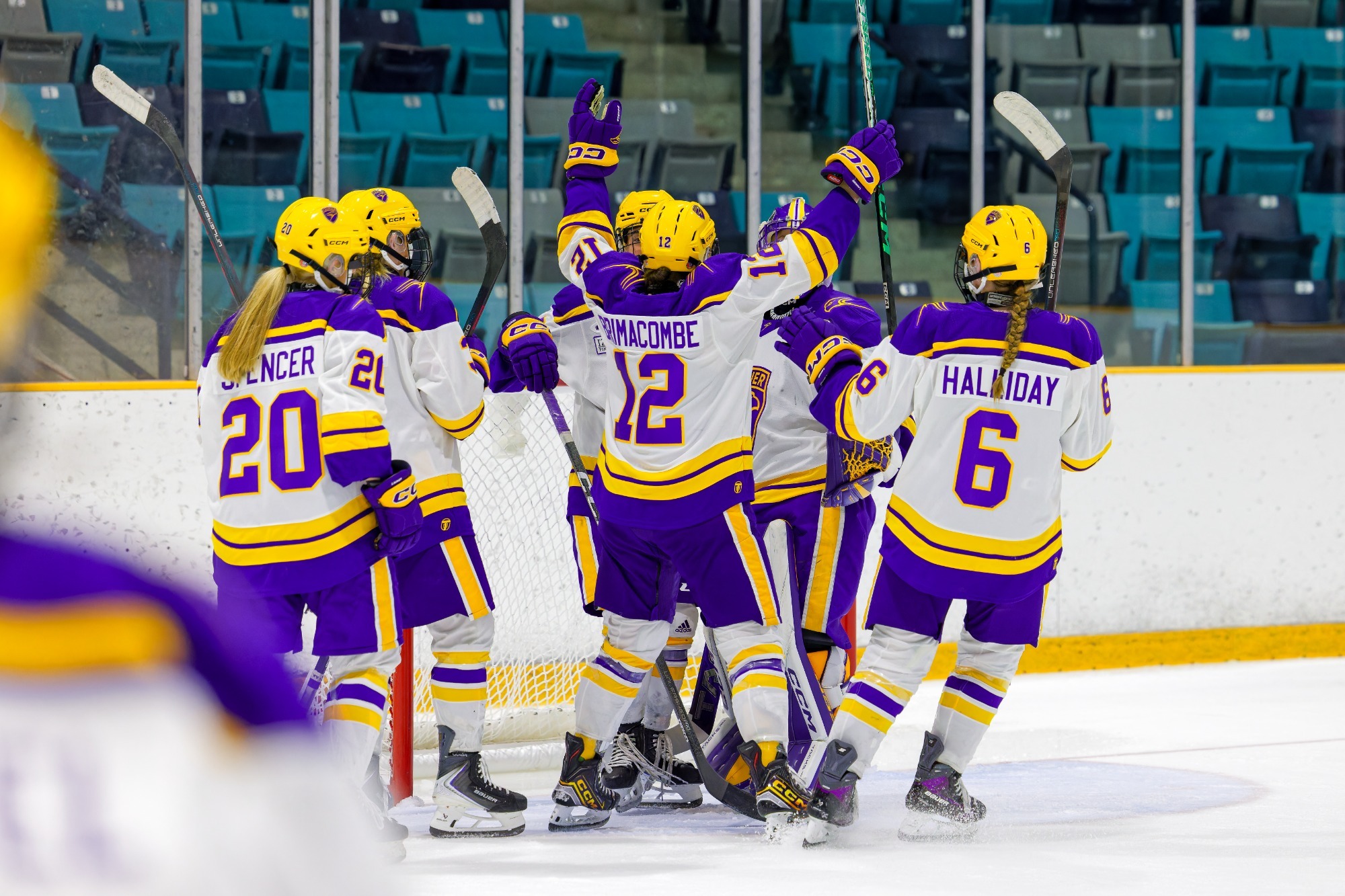 Laurier women's hockey celebrate a win over York