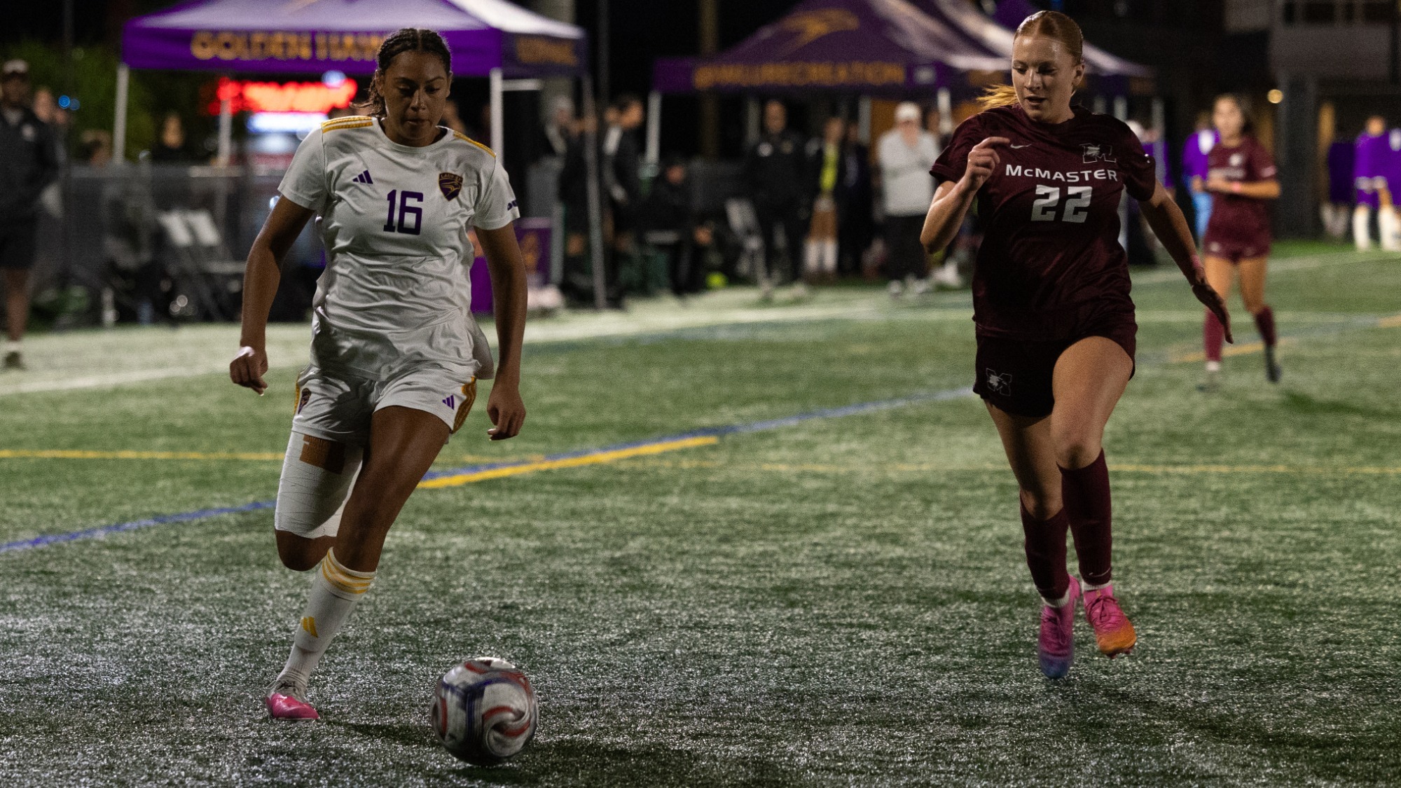 Annick Lariviere chases down a loose ball against McMaster.