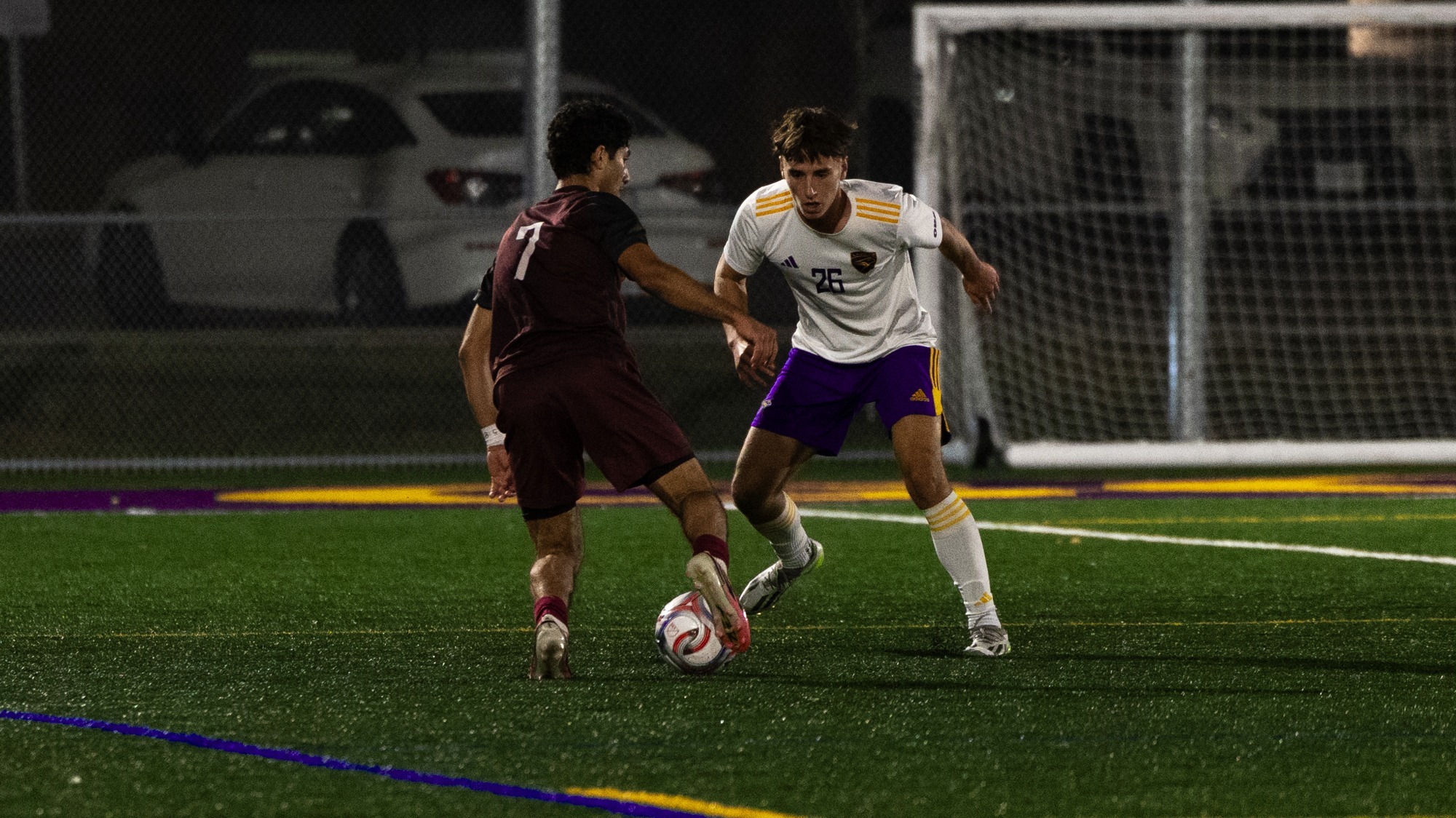 Laurier defends against a McMaster attacker.