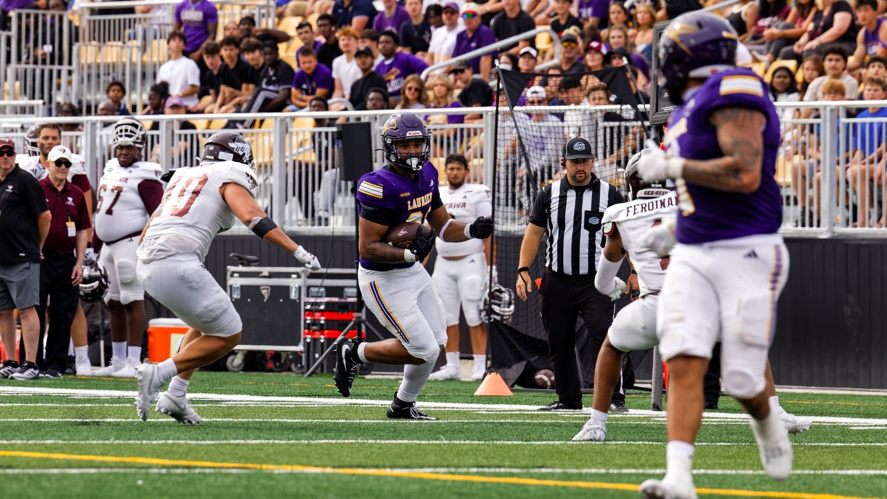 Laurier runs down field against Ottawa