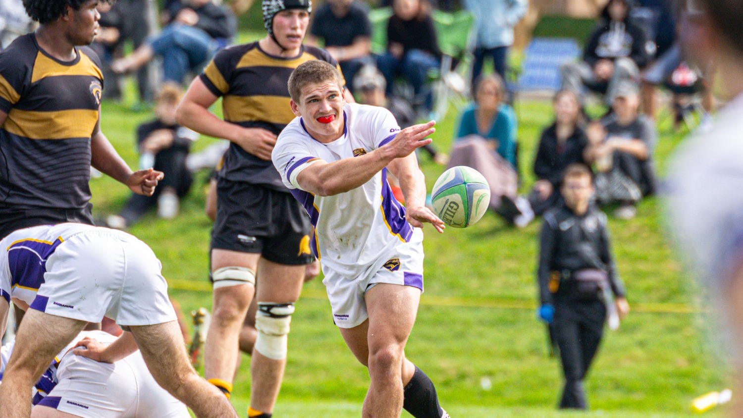 Laurier pass back the ball against Waterloo