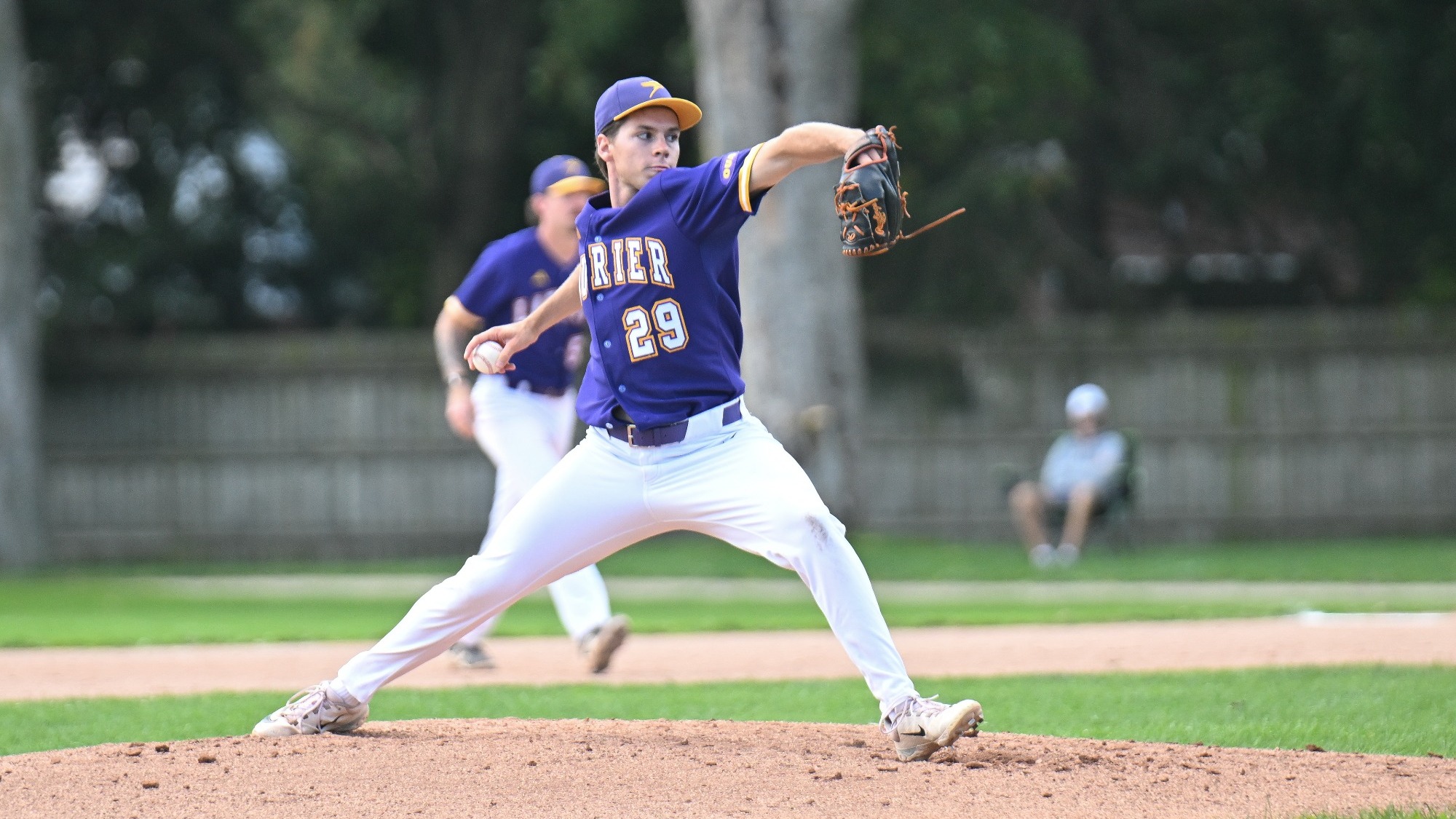Laurier delivers a pitch against the Guelph Gryphons