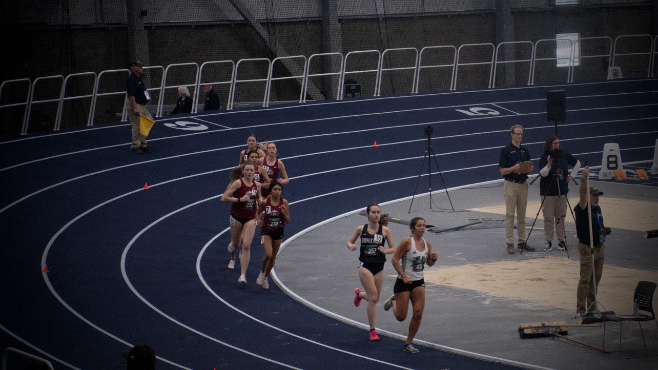 women's track and field action shot
