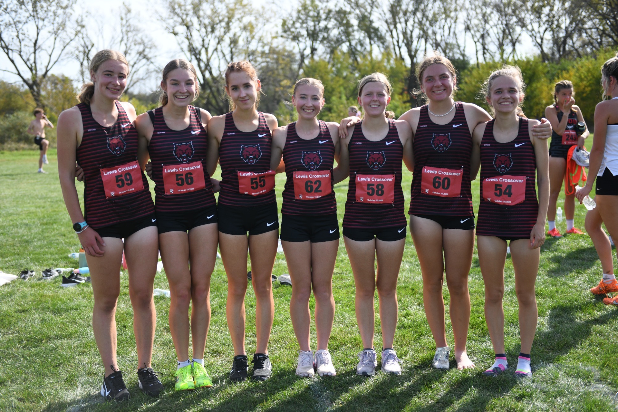 Women's Cross Country poses for team photo after sixth place finish at the Lewis Crossover.