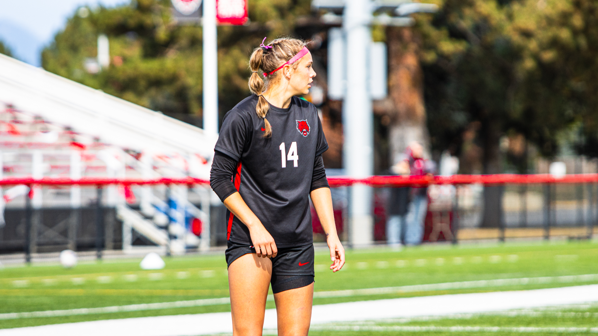 Alexa Stanfield observing the pitch versus Montana State Billings.