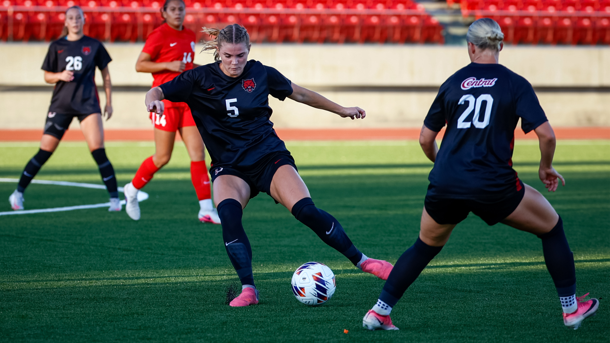 Lainee Derry dribbling the ball vs Seattle Pacific University.