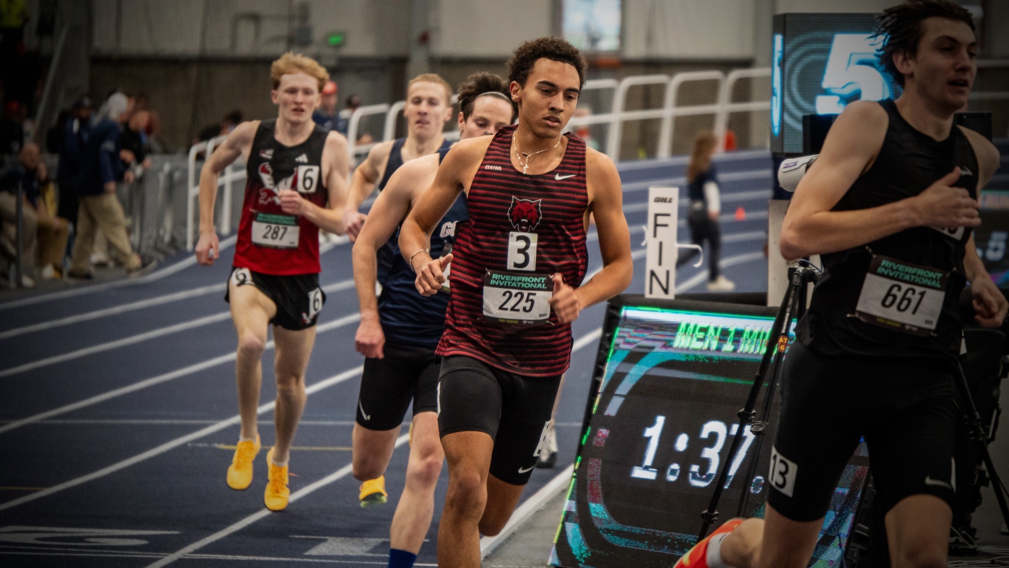 Men's track and field action shot 