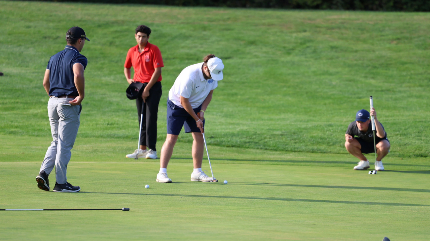 A Wilson golfer makes a putt.